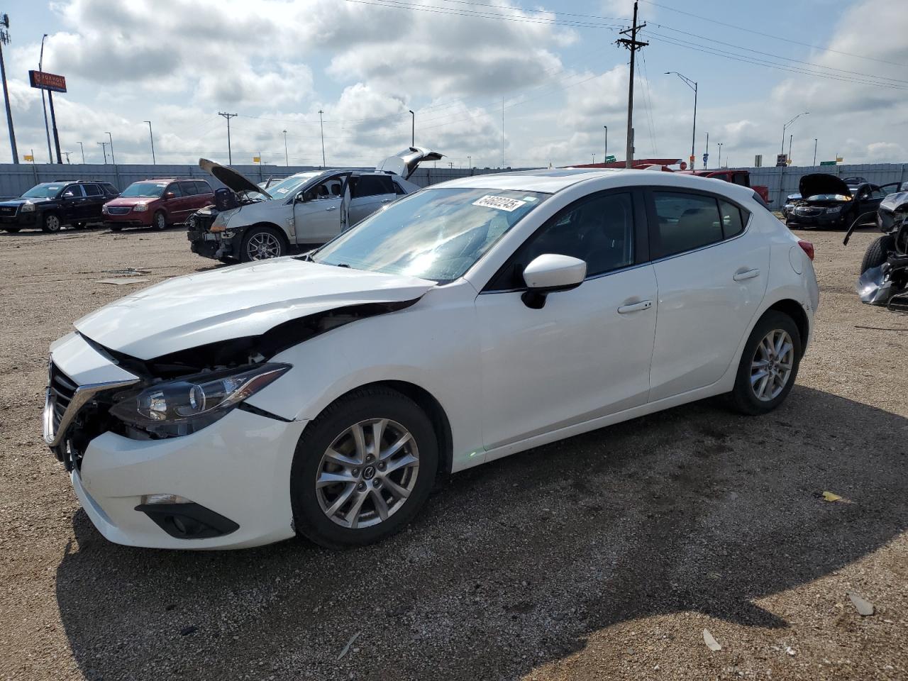2016 Mazda 3 grand to GRAND TOURING