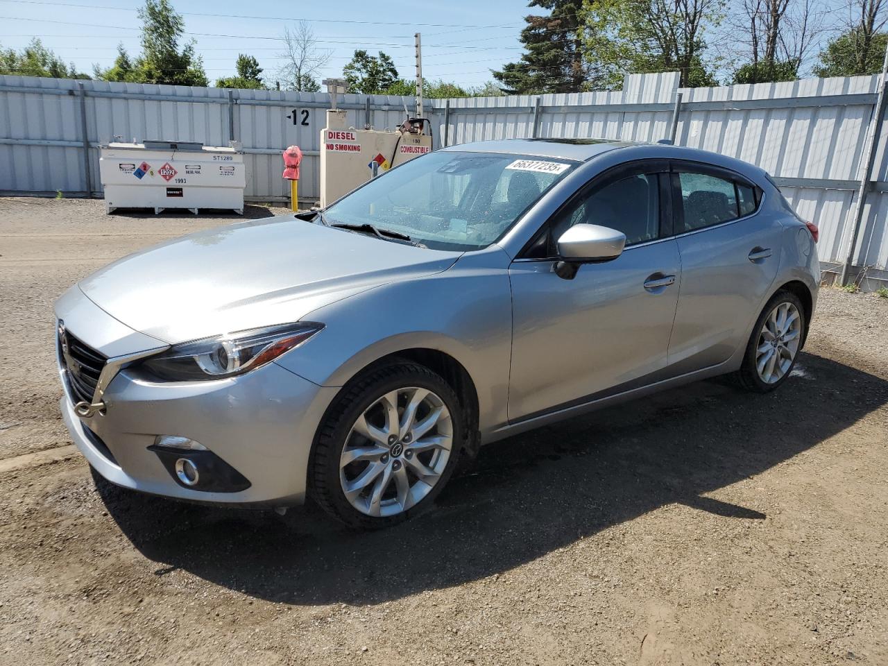 2014 Mazda 3 grand to GRAND TOURING