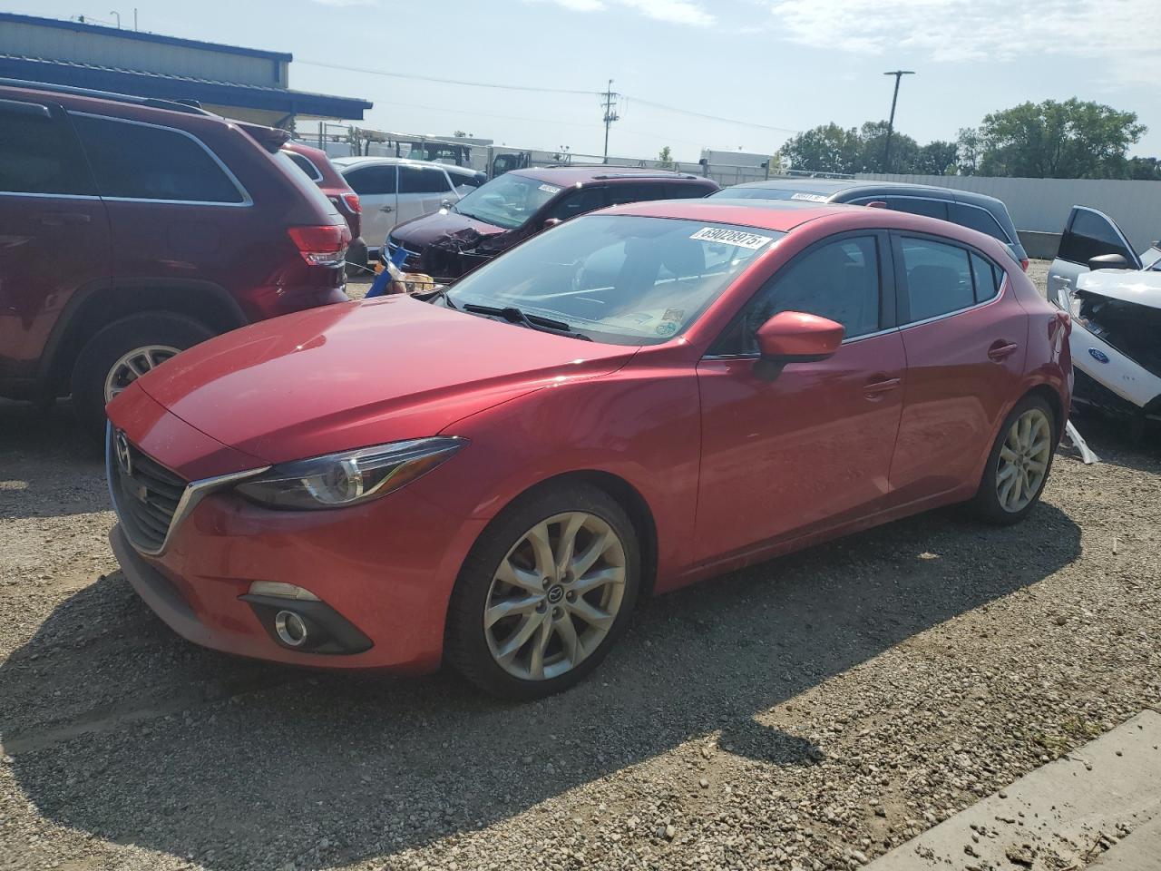 2014 Mazda 3 grand to GRAND TOURING