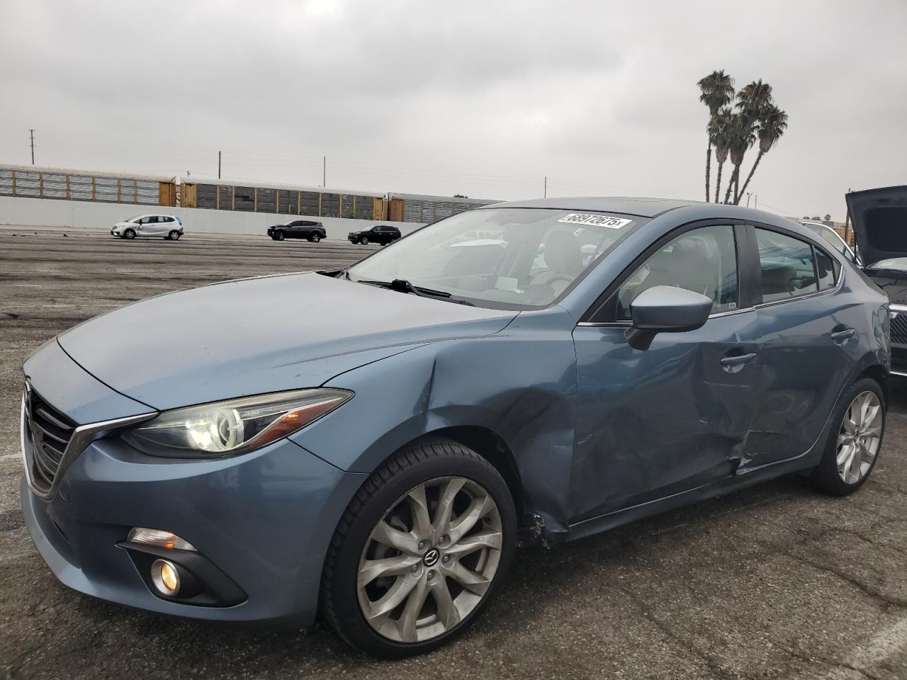 2015 Mazda 3 grand to GRAND TOURING
