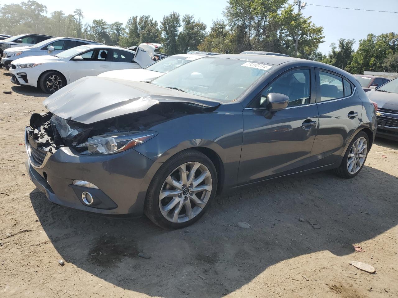 2015 Mazda 3 grand to GRAND TOURING