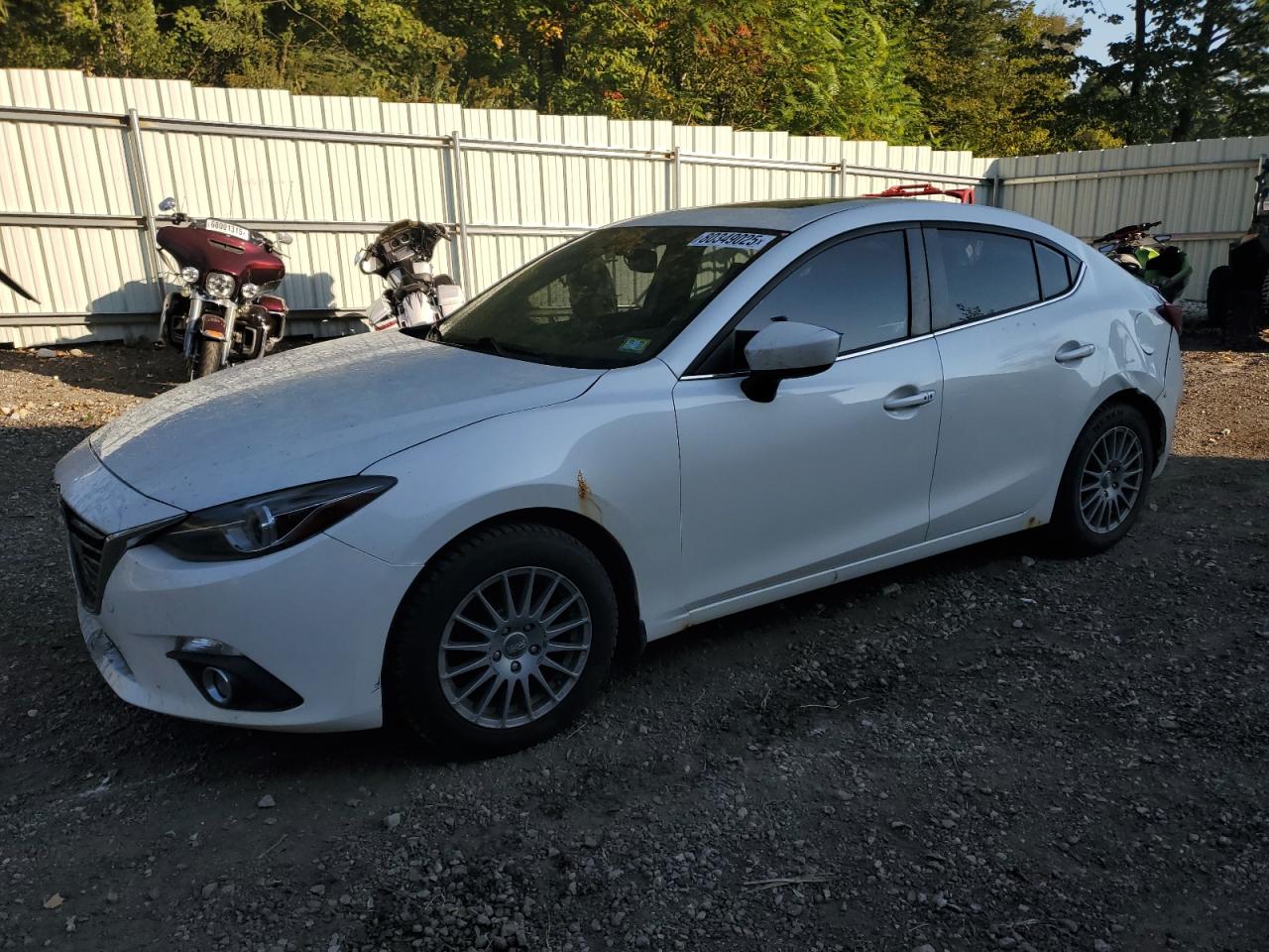 2015 Mazda 3 grand to GRAND TOURING