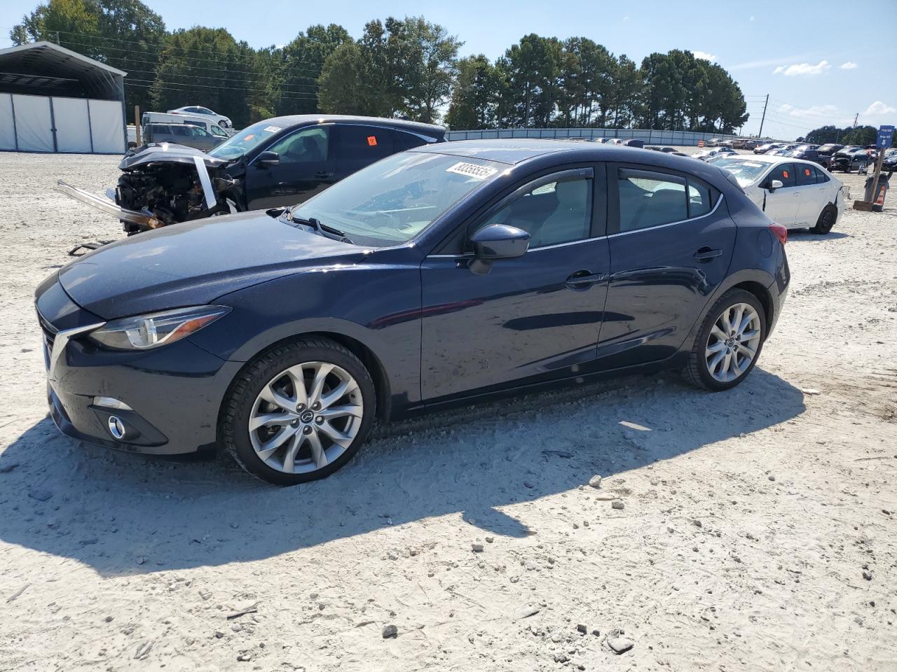 2015 Mazda 3 grand to GRAND TOURING
